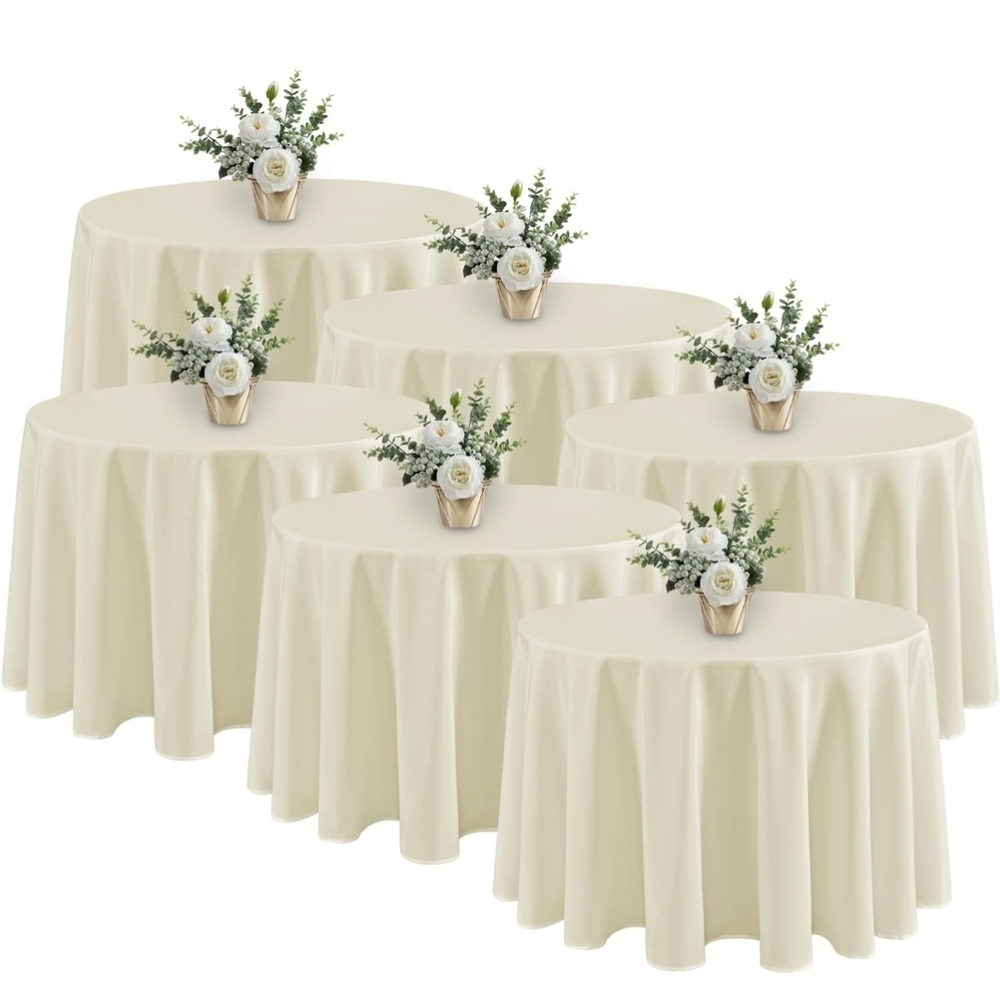 Four 108" Round Cream Tablecloths